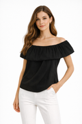 A chic black off-shoulder top with bold ruffle (Hanita)