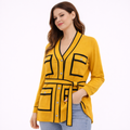 Yellow blouse with black trim belt  (Hanita)
